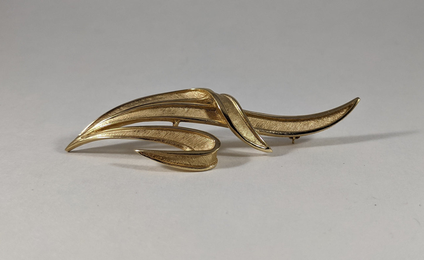 Trifari statement brooch, signed gold tone costume jewelry, vintage 1960s designer leaf pin, elegant scarf or jacket accessory