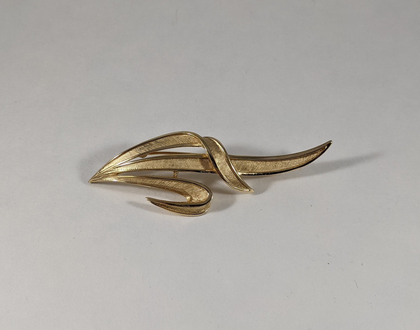 Trifari statement brooch, signed gold tone costume jewelry, vintage 1960s designer leaf pin, elegant scarf or jacket accessory