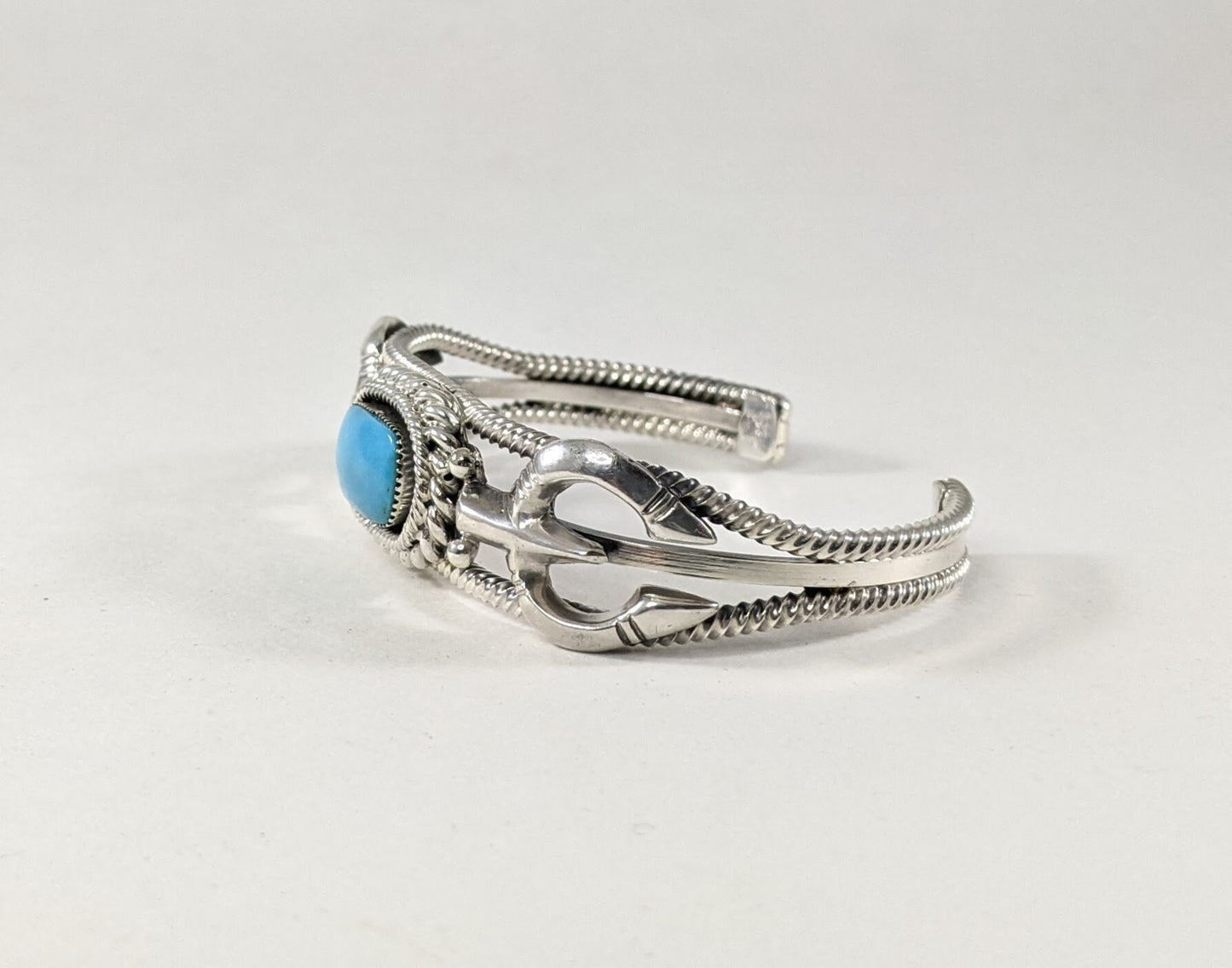 Sterling Silver and Turquoise Cuff Bracelet with Traditional Naja Design and Rope Detail, Signed Running Bear