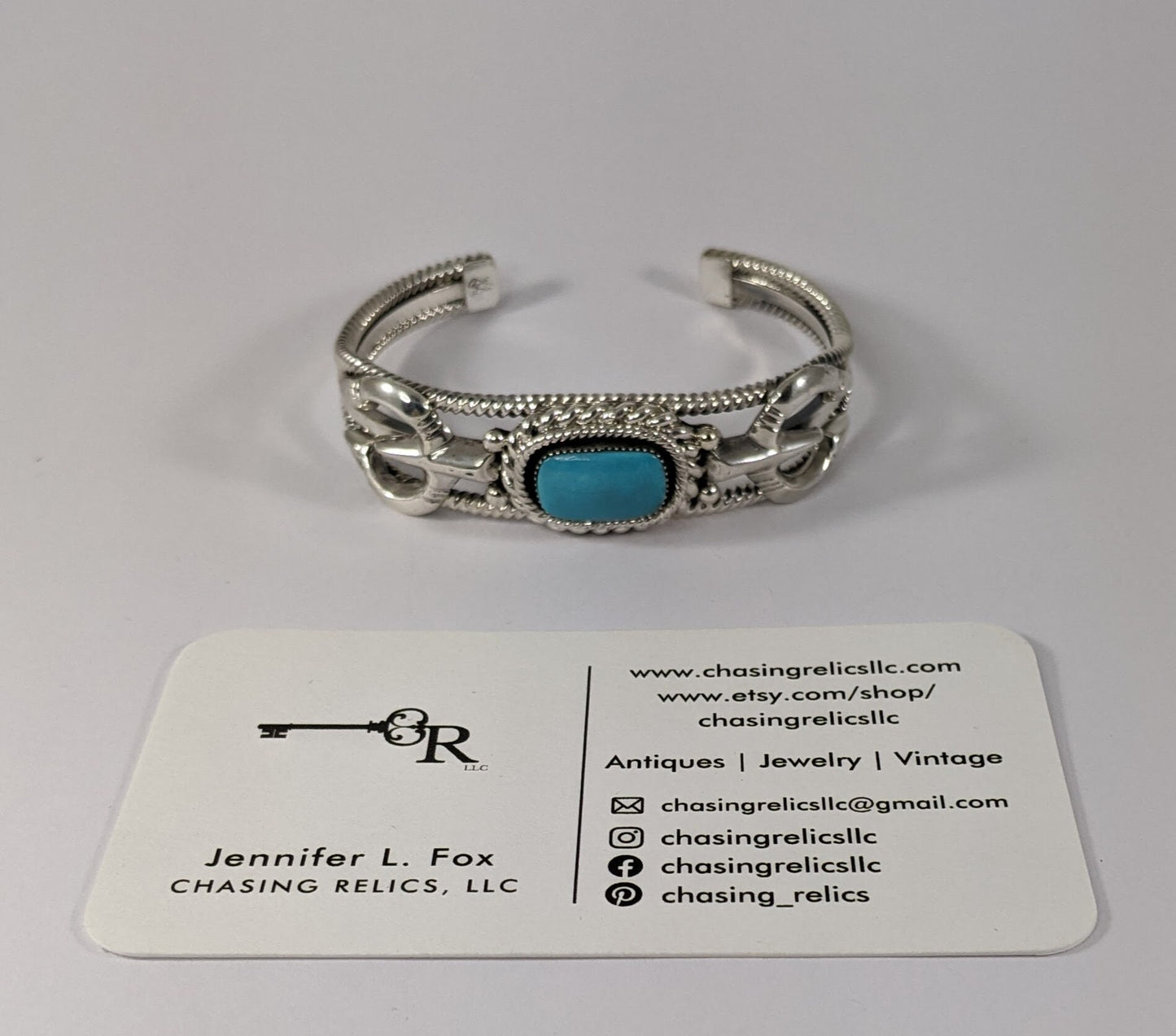 Sterling Silver and Turquoise Cuff Bracelet with Traditional Naja Design and Rope Detail, Signed Running Bear