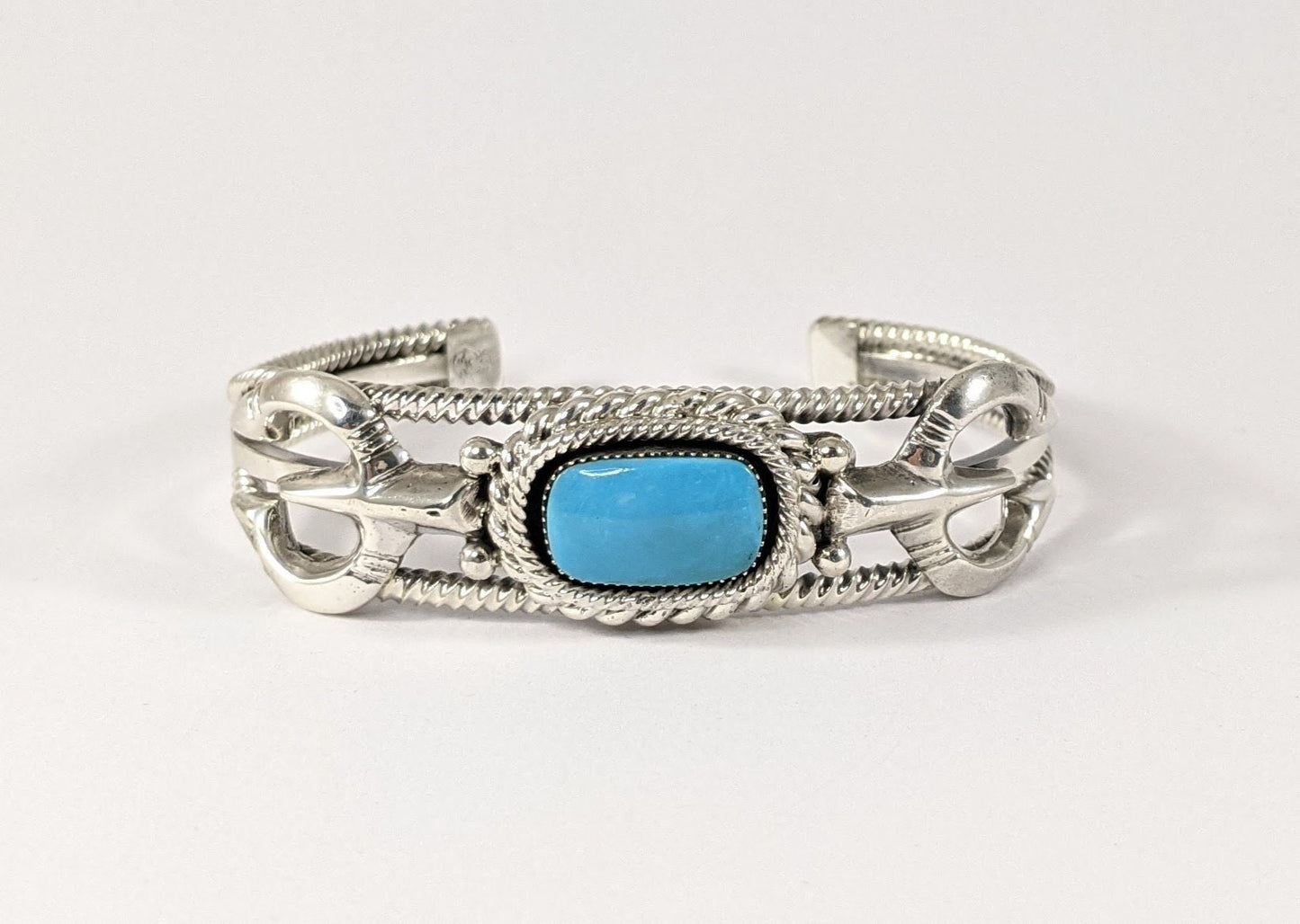 Sterling Silver and Turquoise Cuff Bracelet with Traditional Naja Design and Rope Detail, Signed Running Bear