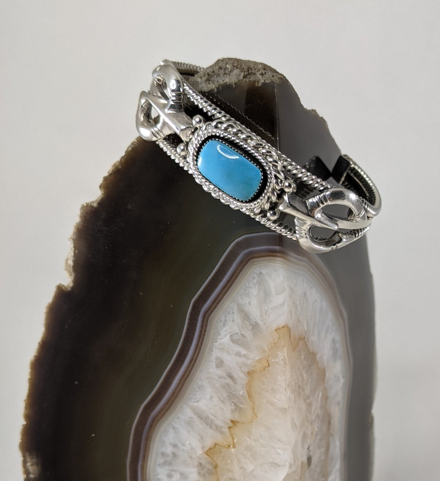 Sterling Silver and Turquoise Cuff Bracelet with Traditional Naja Design and Rope Detail, Signed Running Bear