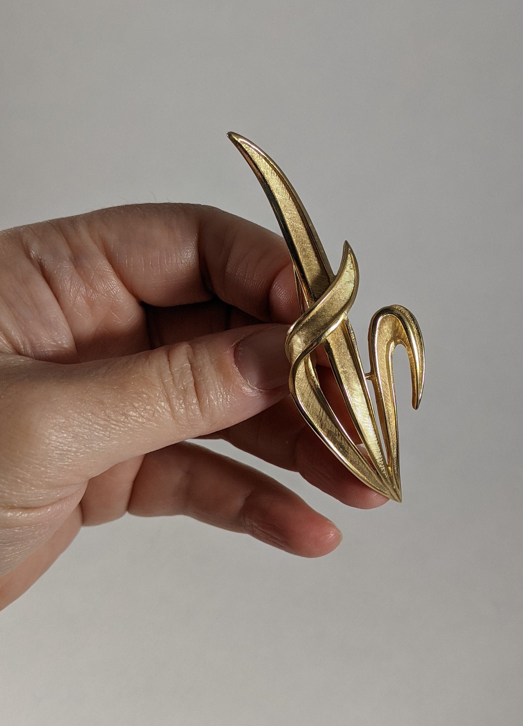 Trifari statement brooch, signed gold tone costume jewelry, vintage 1960s designer leaf pin, elegant scarf or jacket accessory