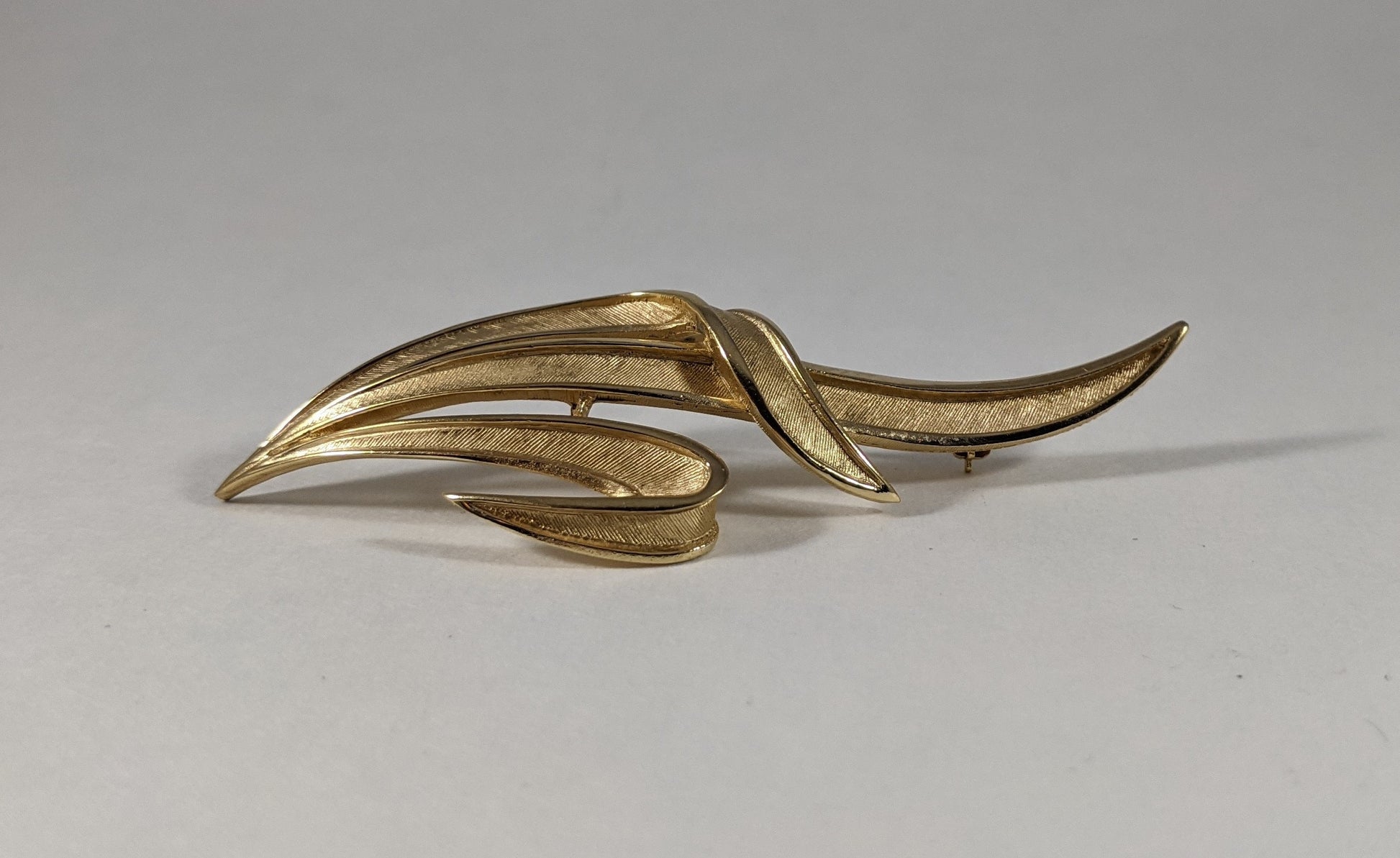 Trifari statement brooch, signed gold tone costume jewelry, vintage 1960s designer leaf pin, elegant scarf or jacket accessory