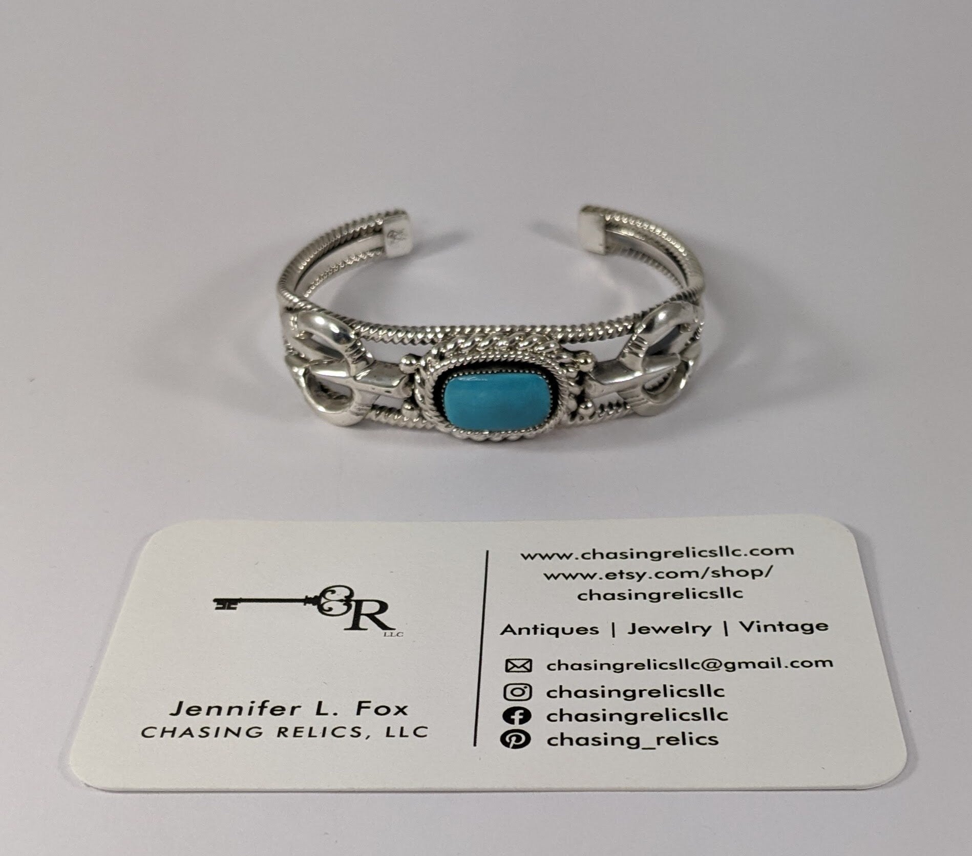 Sterling Silver and Turquoise Cuff Bracelet with Traditional Naja Design and Rope Detail, Signed Running Bear