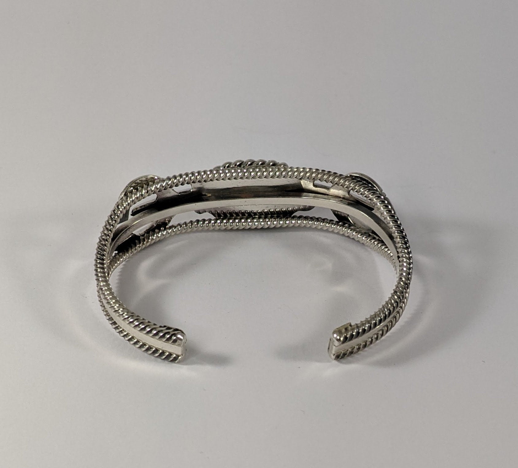 Sterling Silver and Turquoise Cuff Bracelet with Traditional Naja Design and Rope Detail, Signed Running Bear