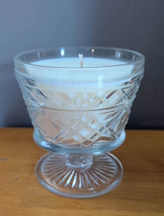 Hand poured 6 oz unscented coco-soy wax blend candle in a clear glass holder, perfect for home decor and relaxation.