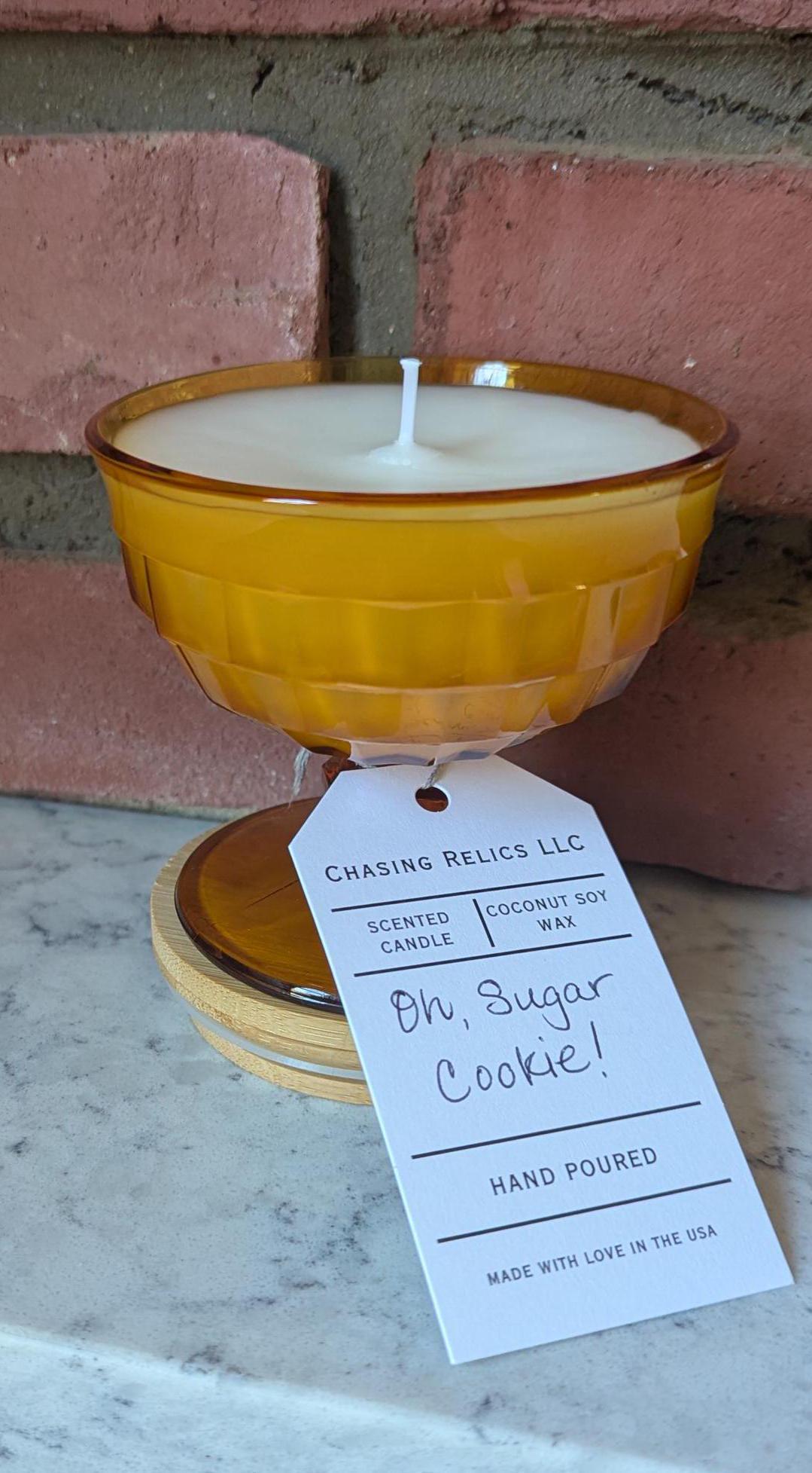 Hand-poured vintage glass candle with coco-soy wax blend, 'Oh, Sugar Cookie!' scent, amber cubist design, 6oz.